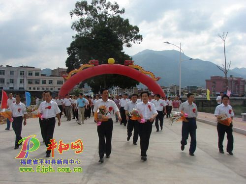 坂仔鎮(zhèn)鎮(zhèn)區(qū)左岸防洪堤工程竣工暨江濱大道通車剪彩儀式